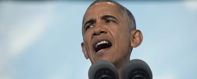 US President Barack Obama speaks during a Hillary for America campaign event in Greensboro, North Carolina, October 11, 2016. / AFP PHOTO / JIM WATSON