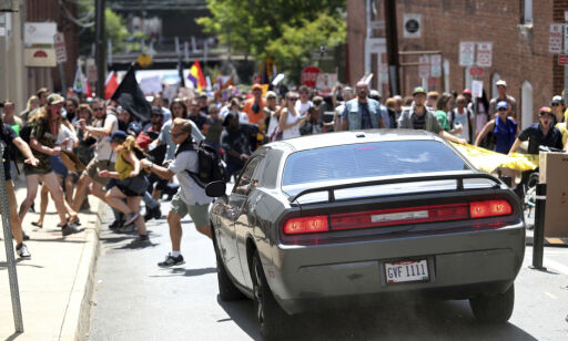 A vehicle drives into a group of protesters demonstrating against a white nationalist rally in Charlottesville, Va., Saturday, Aug. 12, 2017. The nationalists were holding the rally to protest plans by the city of Charlottesville to remove a statue of Confederate Gen. Robert E. Lee. There were several hundred protesters marching in a long line when the car drove into a group of them. /The Daily Progress via AP)