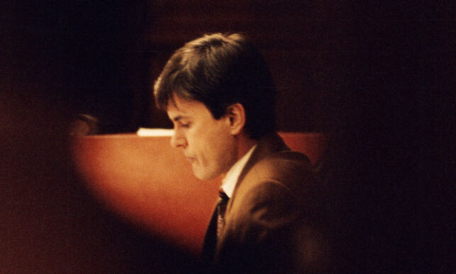 FILE - In this Feb. 2, 1995 file photo, John Ausonius sits during a trial in Stockholm's district court. Prosecutors in Frankfurt said Tuesday, May 9, 2017, that Ausonius is suspected of killing 68-year-old Blanka Zmigrod, an employee at a Moevenpick restaurant, on Feb, 23, 1992, and taking her handbag. (Tobias Rostlund/TT News Agency via AP, File)